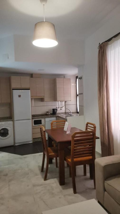 Apartamentos La Casa Del Pozo Santo Sevilha Exterior foto